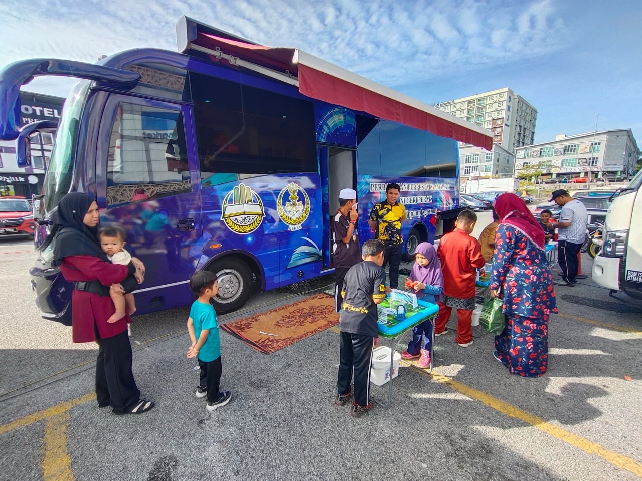 PERKHIDMATAN PERPUSTAKAAN BERGERAK SEMPENA KARNIVAL KITA ANAK MALAYSIA (KAMI 2025)